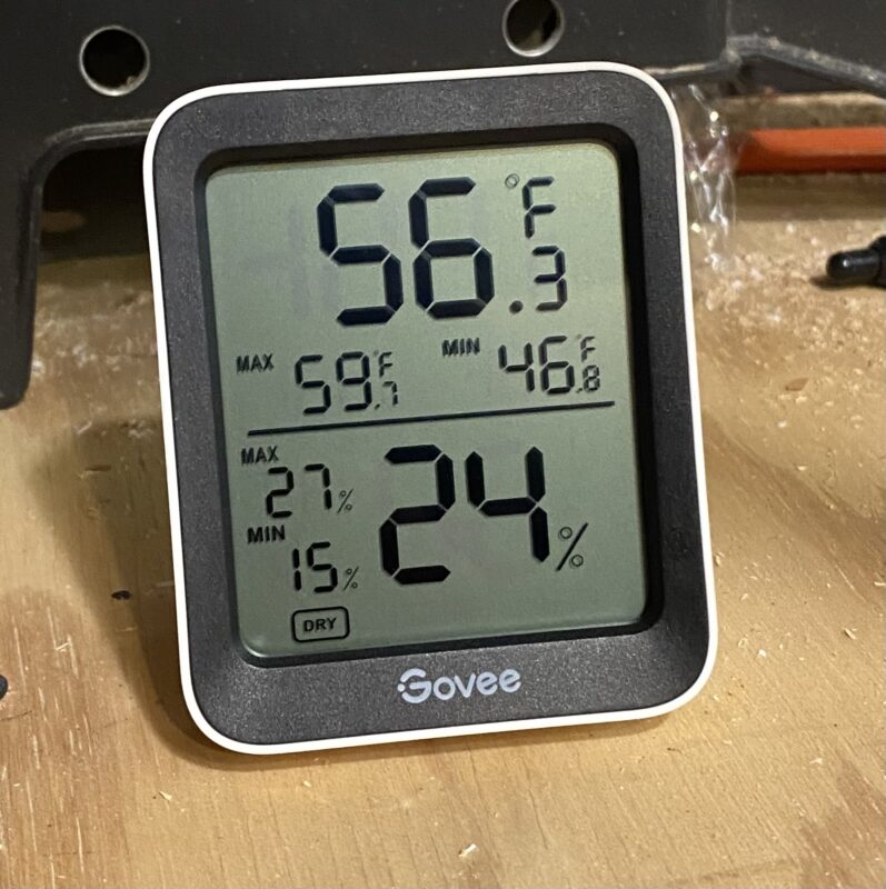 Govee bluetooth thermometer and hygrometer showing 56*F/24% in a garage