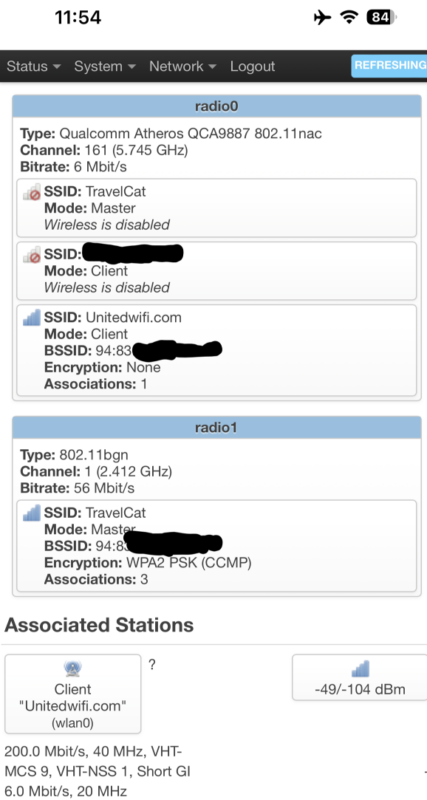 Screenshot of GL.iNet connected to United in-flight Wi-Fi on radio0 (5 GHz band) and broadcasting TravelCat on radio1 (2.4 GHz band)